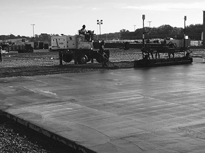 men working on creating the base of the construction