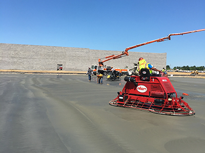 men working on paving the road
